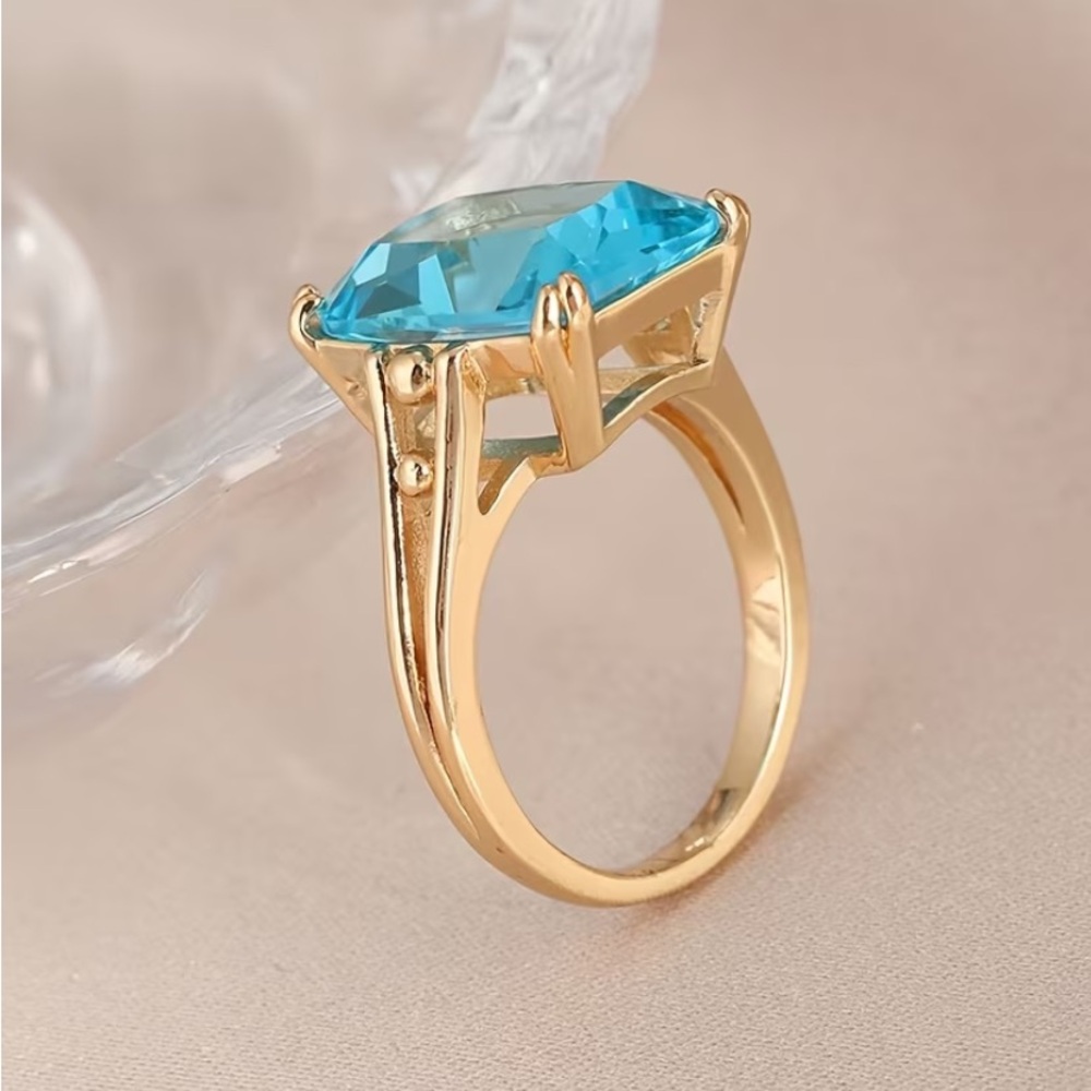 18k Gold Plated Ring with Vibrant Blue Aquamarine Emerald-Cut Stone - Picture 5 of 7